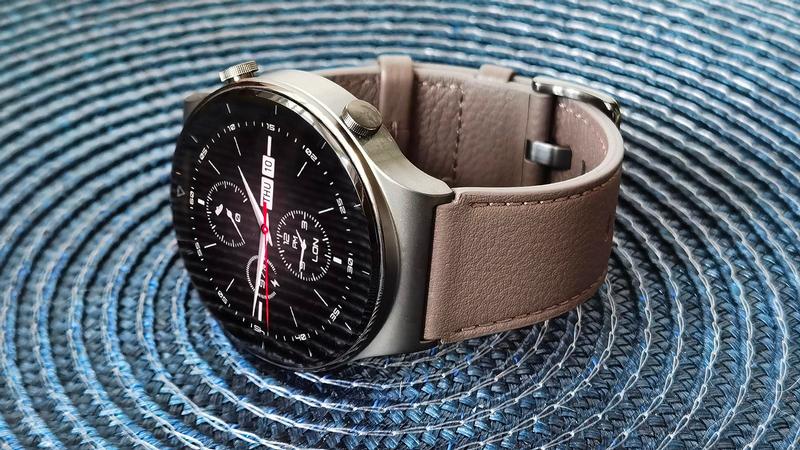 huawei watch gt 2 pro on table side screen on