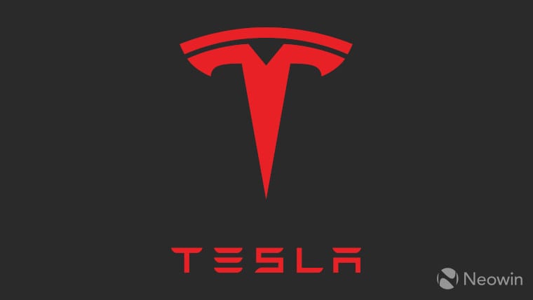 The Tesla logo on a dark grey background