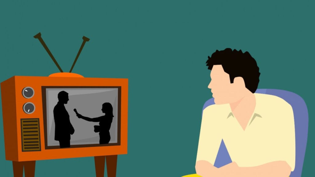 Nas televisões antigas era comum ter ruído, na imagem vemos alguém assistindo uma tv antiga