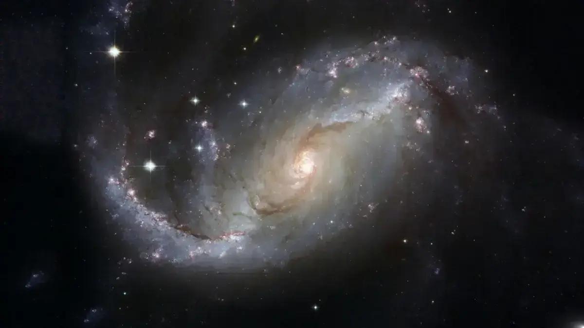Galáxia antiga desafia teorias sobre formação estelar e evolução do universo